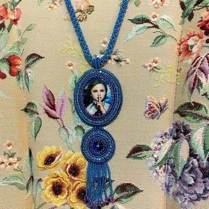 Beautiful Painted Lady hand beaded cabachon.